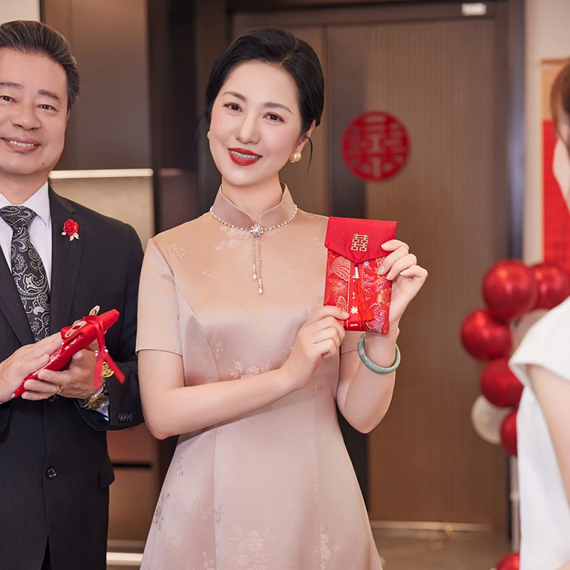 朵妮娜喜妈妈喜婆婆高端婚宴礼服香槟粉色年轻旗袍修身显瘦1465