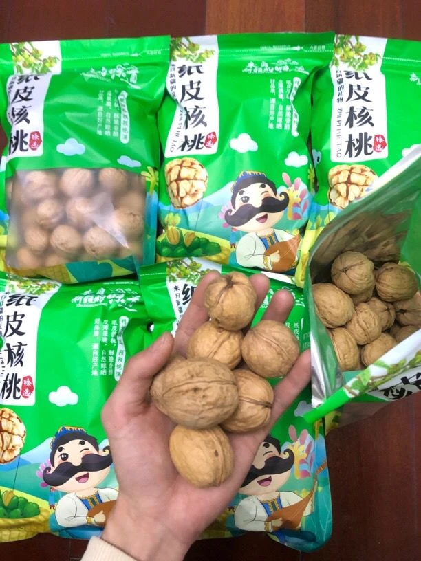 新疆纸皮核桃薄皮香脆原味自然晾晒剥开大果饱满无添加温肺定喘