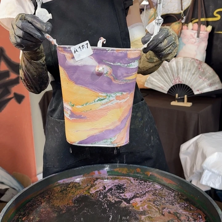 187橙紫烟霞珍珠水桶包