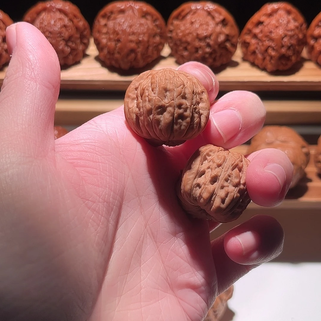 往***丁文玩核桃吊坠31天下第一楼