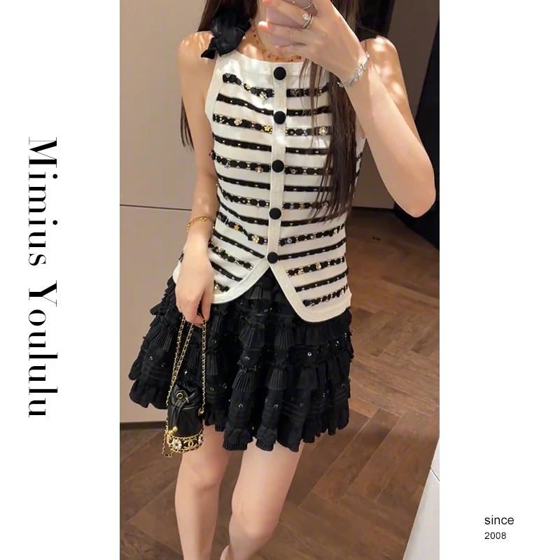 【mimius】婷婷 甜美撞色条纹蝴蝶结重工钉珠针织上衣 WG05038