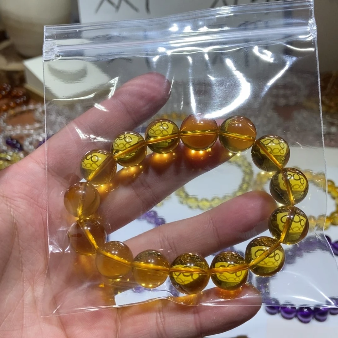 颜***玉非金属14mm黄水手串放漏款