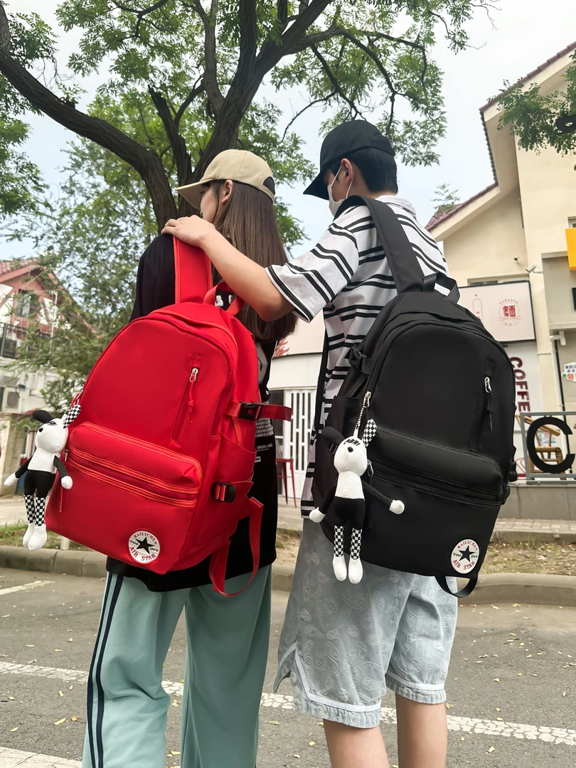 竖款简约风印花电脑包双肩背双根字母休闲双肩包中学生时尚