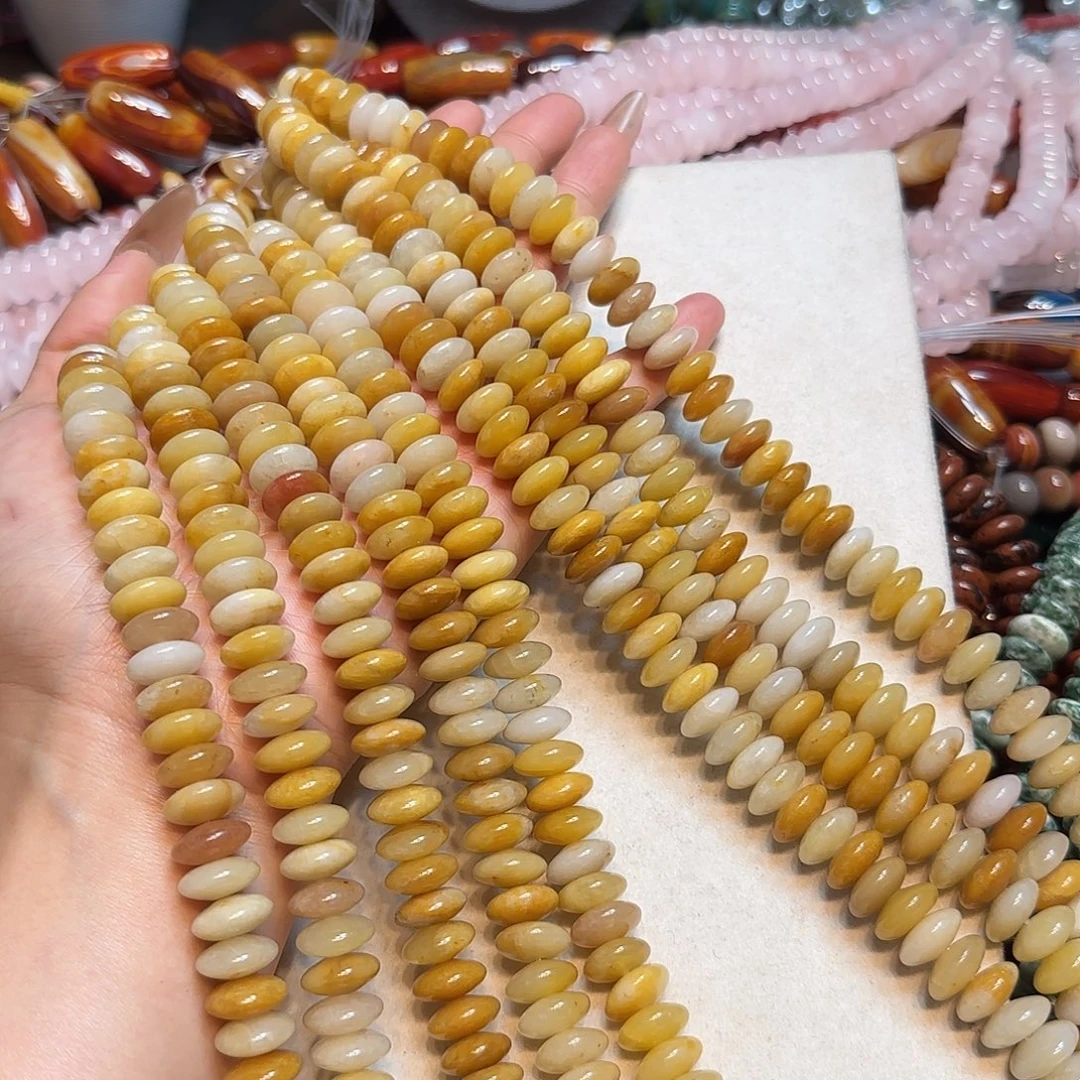 玛瑙/玉髓未镶嵌珠宝半成品12mm黄玉飞碟算盘一条