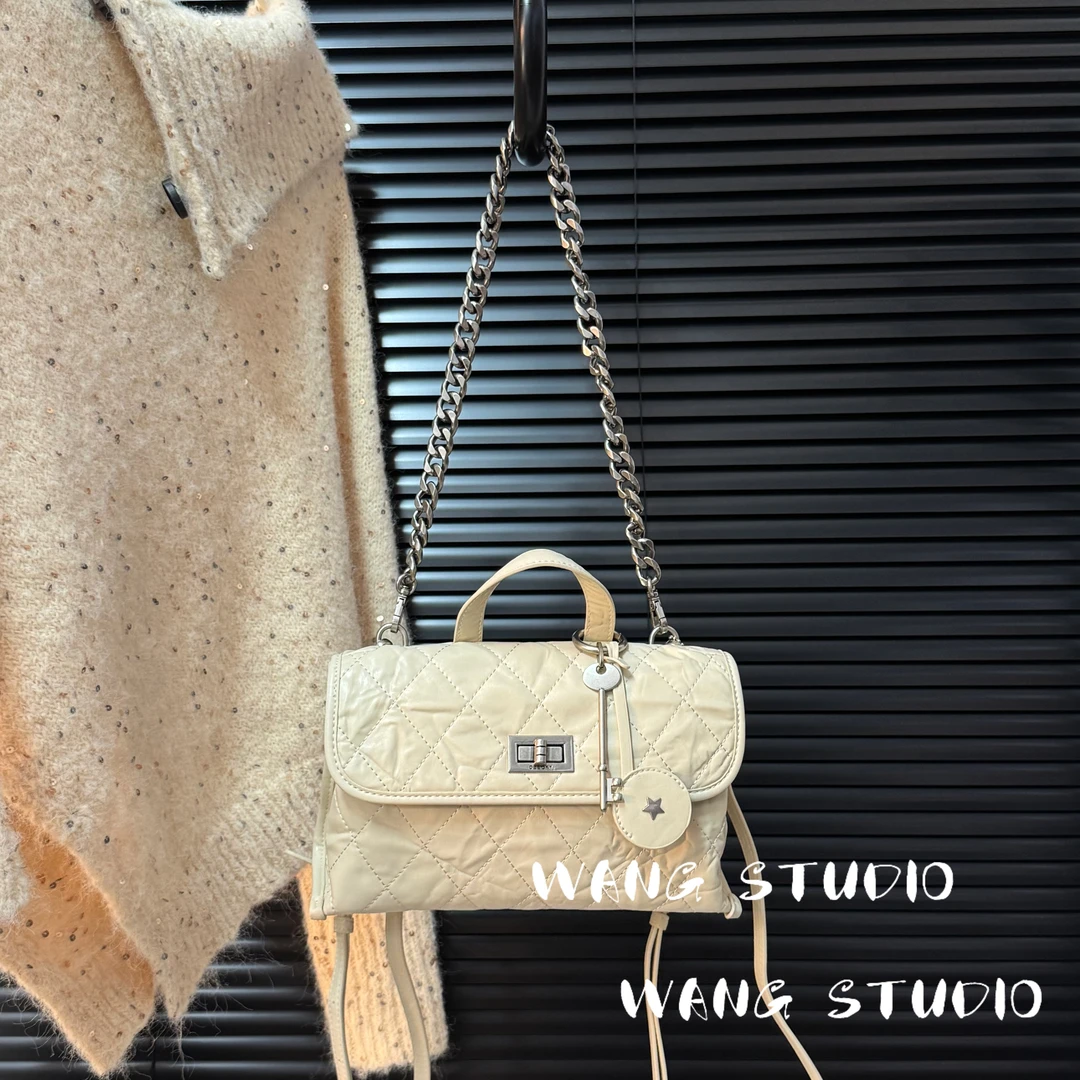 调调包包WANG STUDIO【褶皱设计 小众设计款 游牧白褶皱菱格双肩】