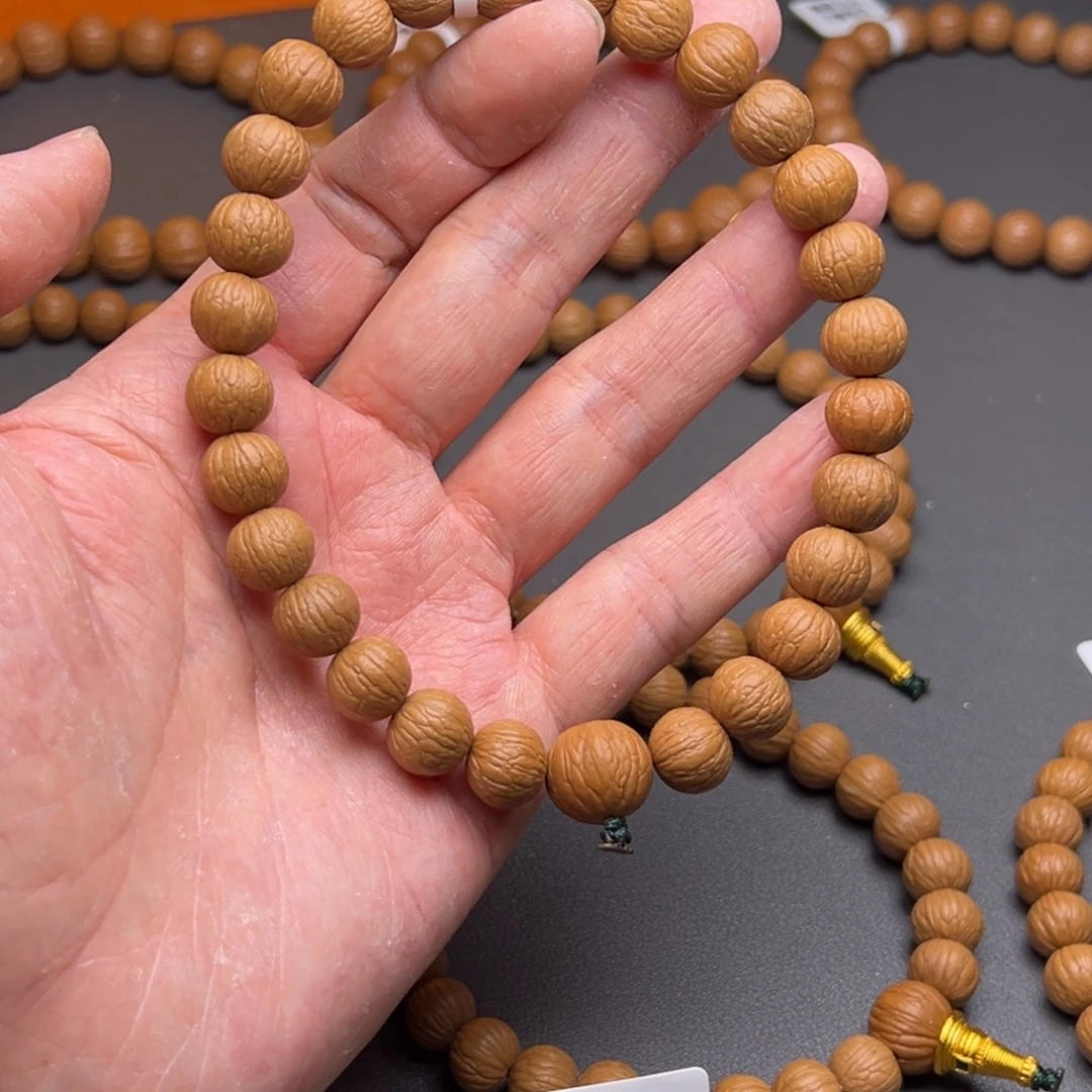 心***人猴头核桃吊坠凤羽