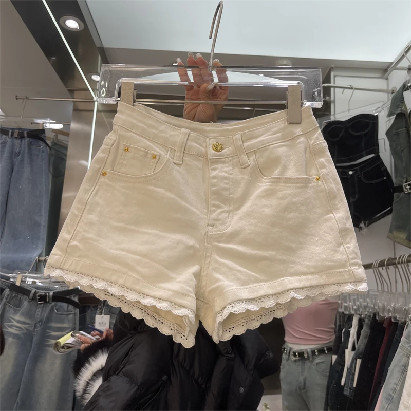 甜美辣妹蕾丝拼接白色牛仔短裤2025年夏季新款时髦潮流阔腿热裤女