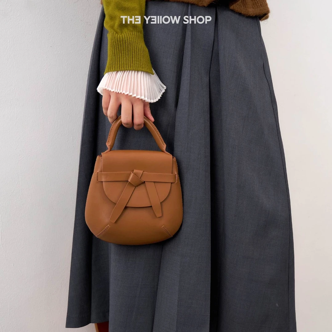 THE YELLOW SHOP古典学院风帕纳头层牛皮斜挎手拎绑结马鞍包包包