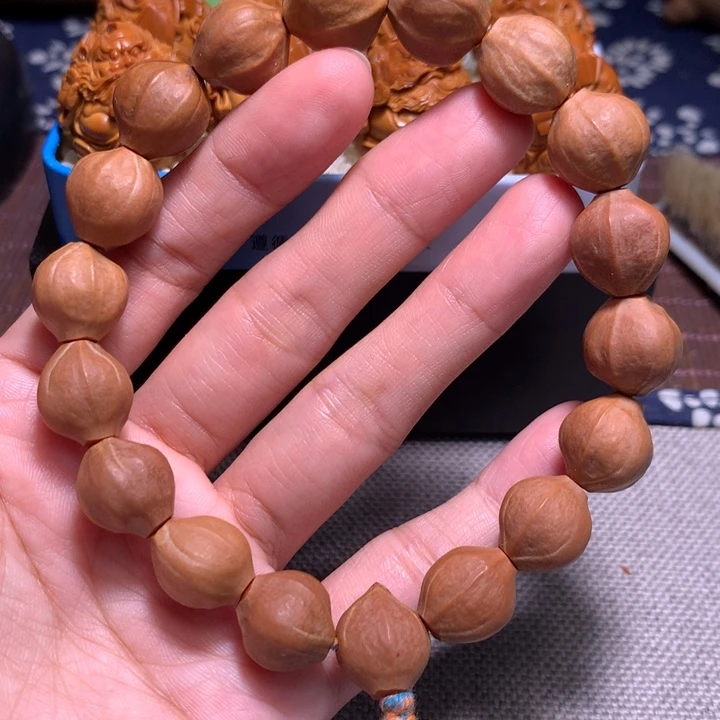 橄榄核吊坠蜜桃臀