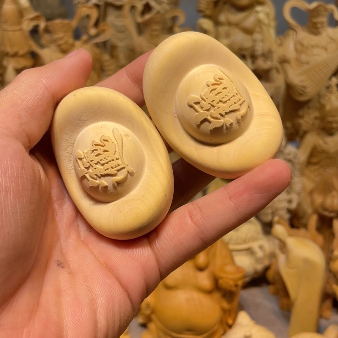 黄杨木小瑕疵金元宝一对