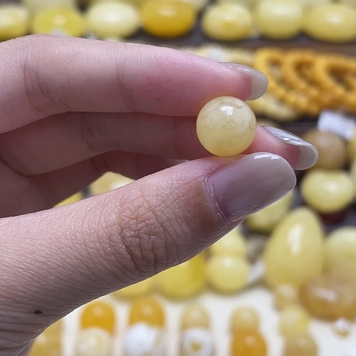 琥珀未镶嵌裸石10.6mm金白妖花圆珠瑕