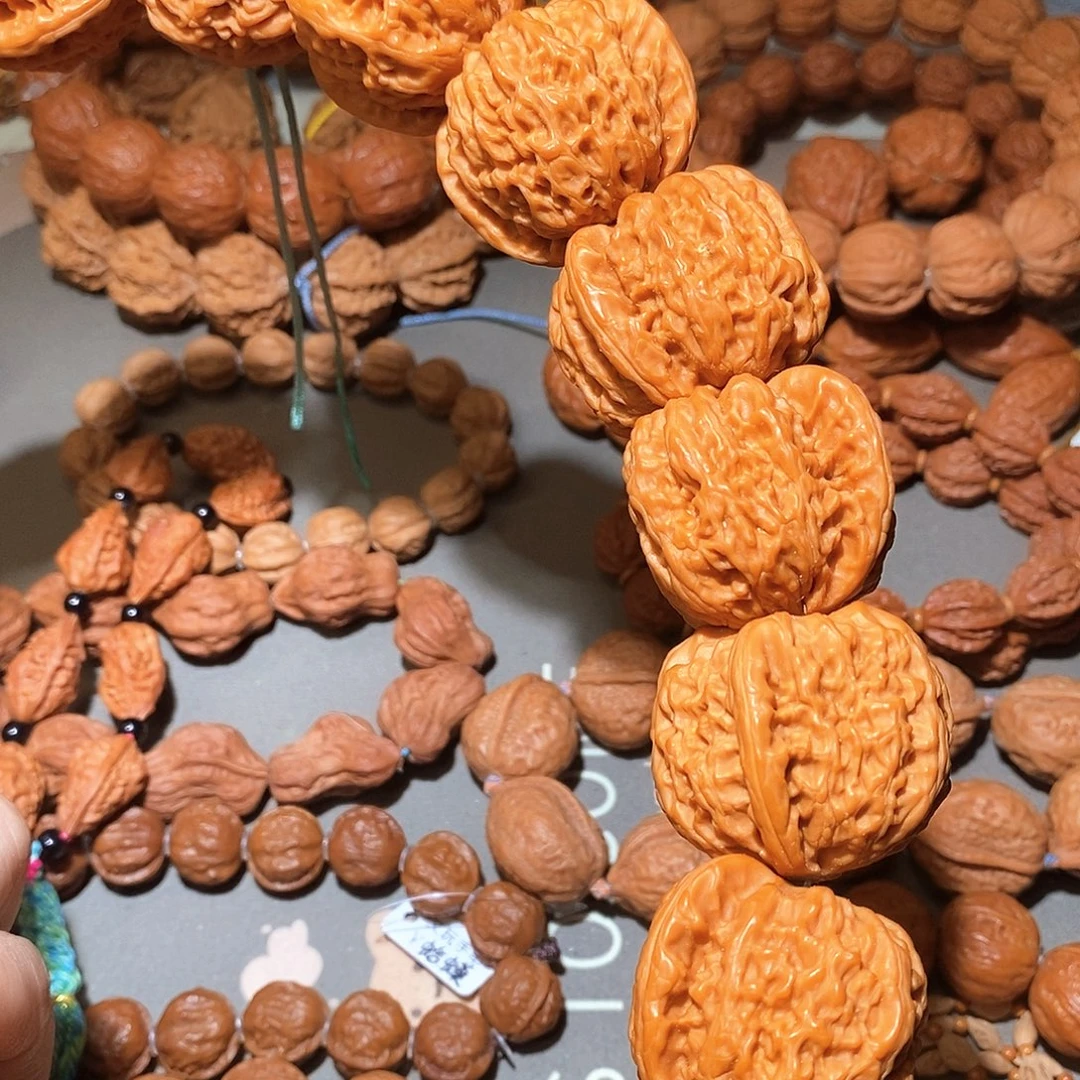 张***林文玩核桃吊坠白狮子