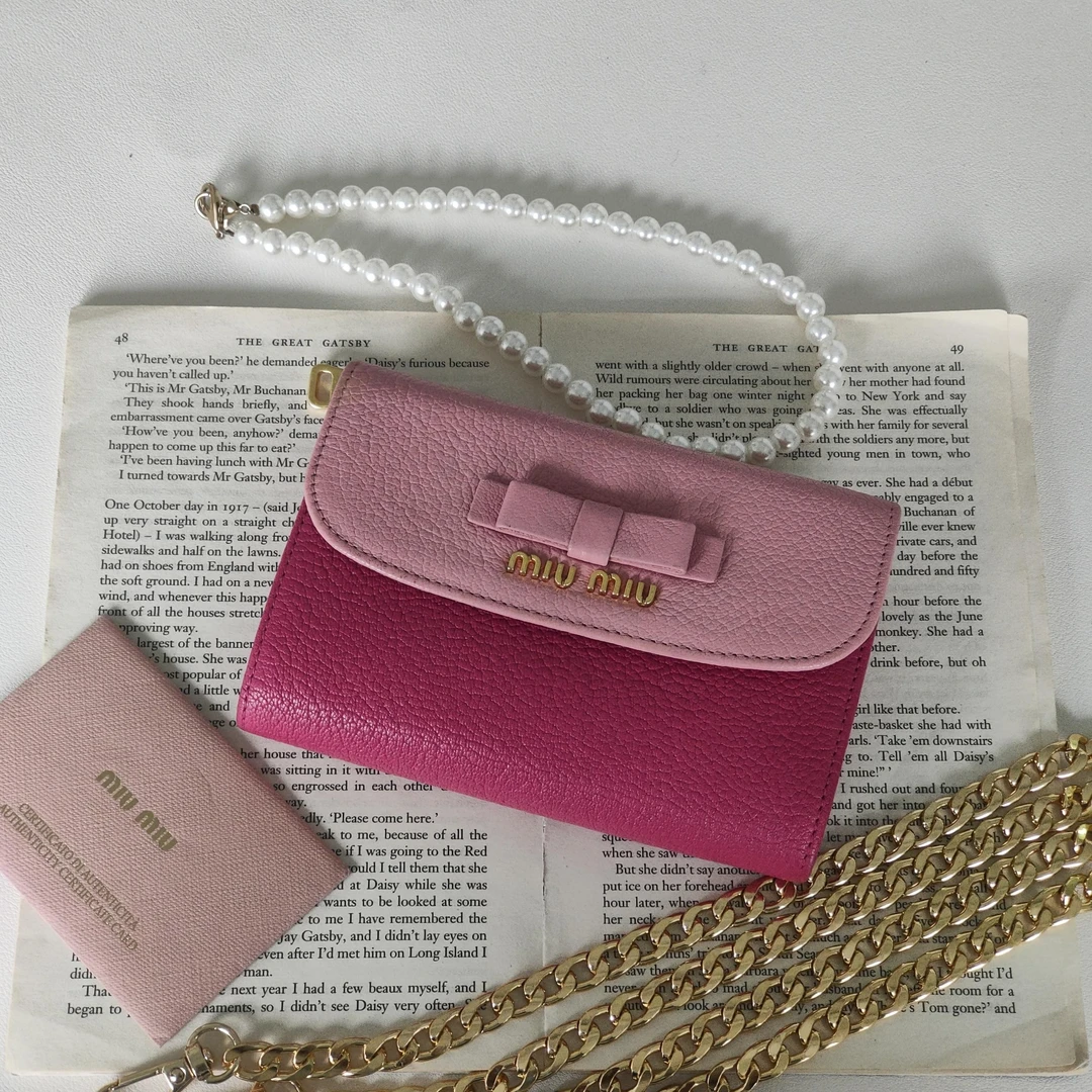 95新 MIU MIU/缪缪 Azul -  糖果粉双拼三折双面钱包 42155