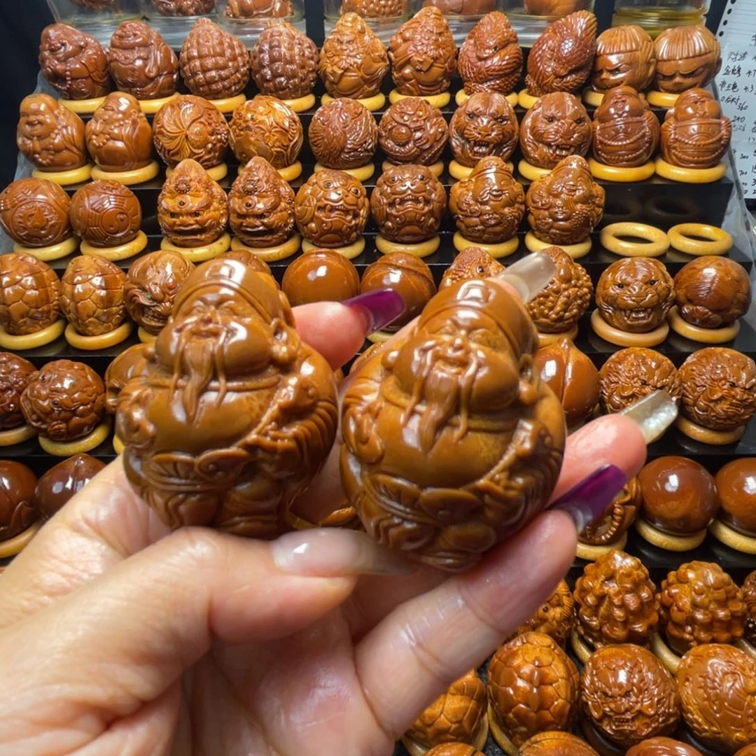 ＠***乐橄榄核把件橄榄球