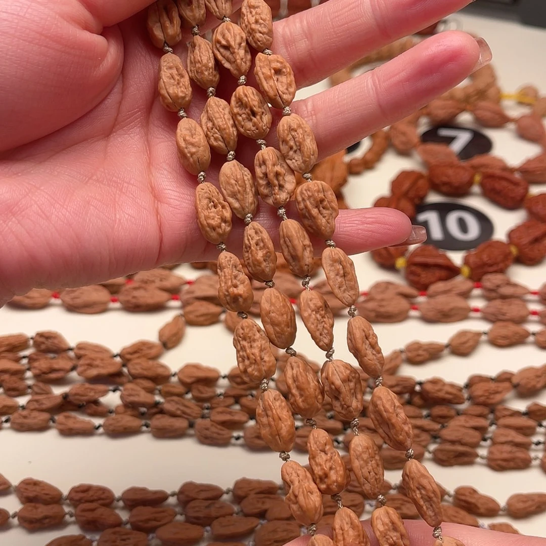 倪***好吊坠文玩核桃异形脖挂