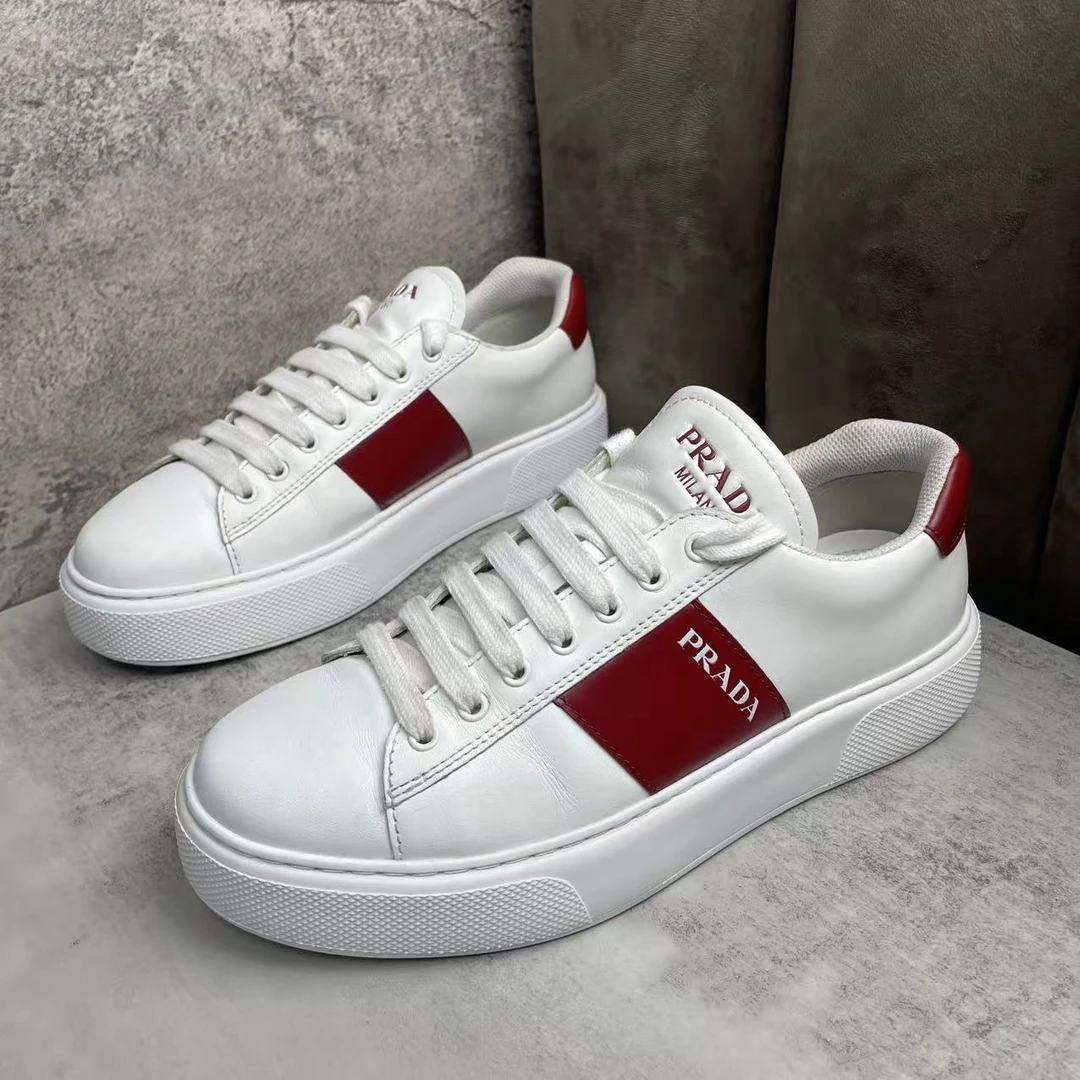 95新 Prada/普拉达 白色皮革侧翼红标时尚百搭厚底板鞋/42.5码