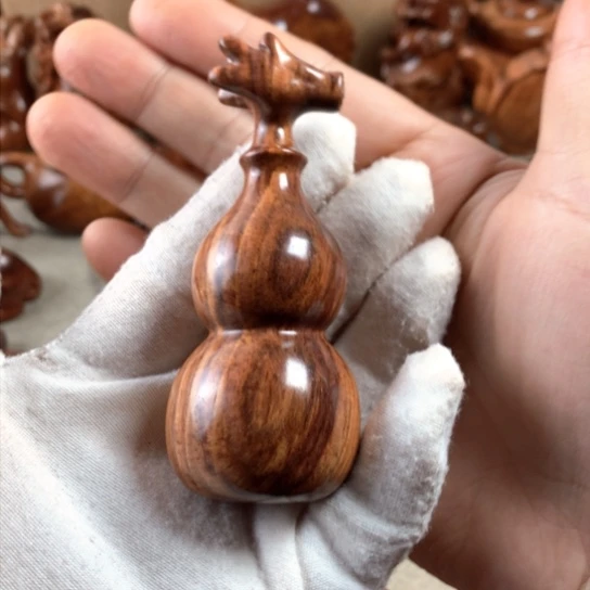 黄花梨/降香黄檀腊****寒把件