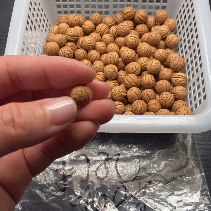 终***飞桃核吊坠散籽发货150