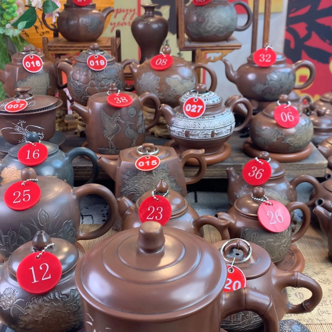 紫砂茶壶工*兵坭兴陶手工刻绘水杯竹子