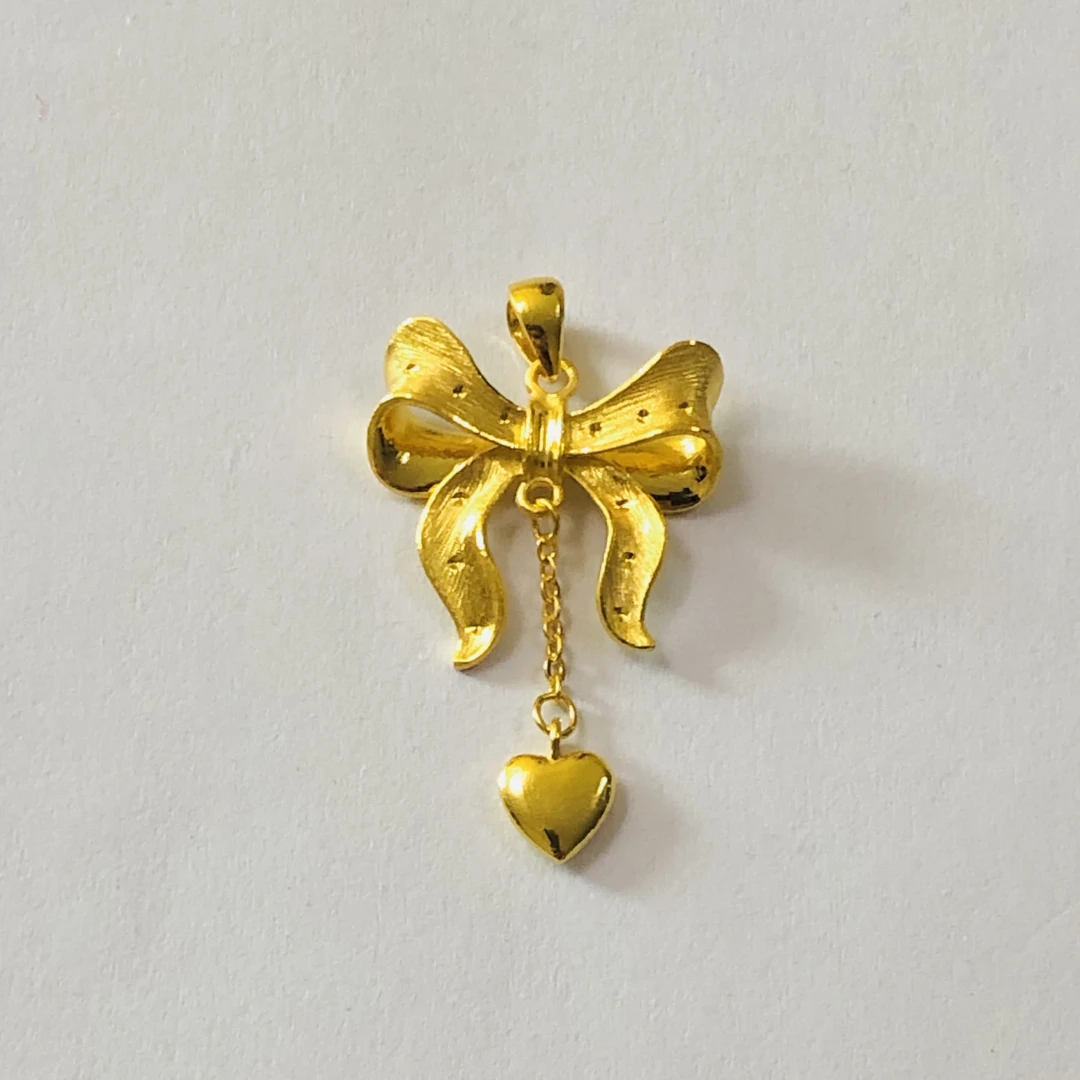 萃华足金在逃公主吊坠传统工艺