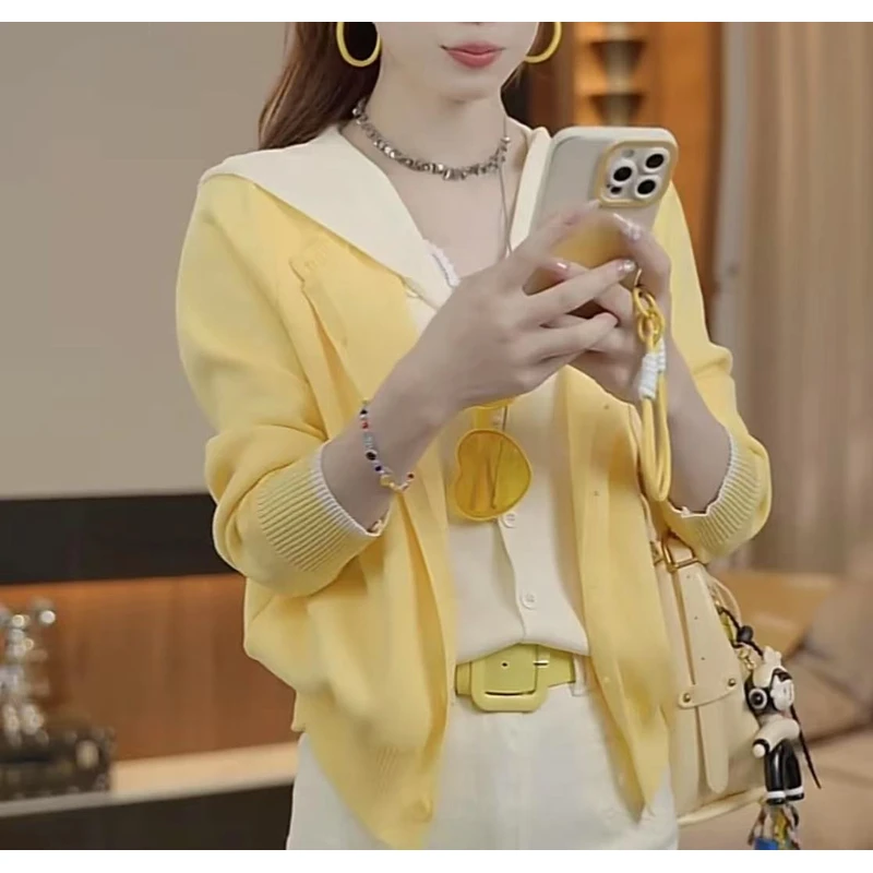 2025春新款洋韩系假两件撞色针织衫女气毛衣开衫气质连帽长袖上衣