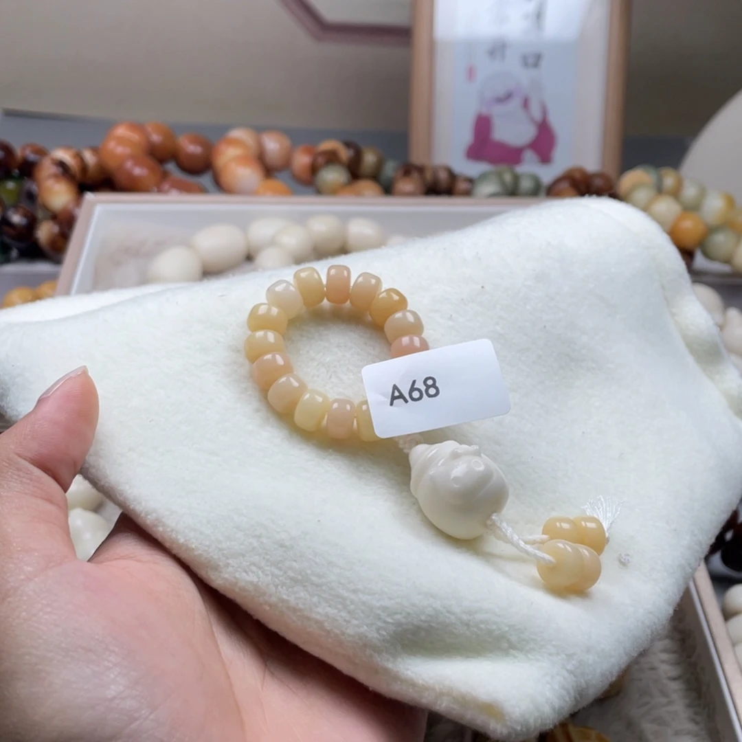 吊坠菩提根/象牙果A68跑环9mm一串