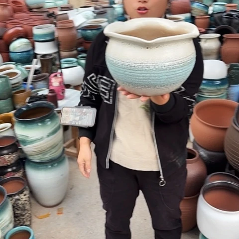 口25高18一个盆子。