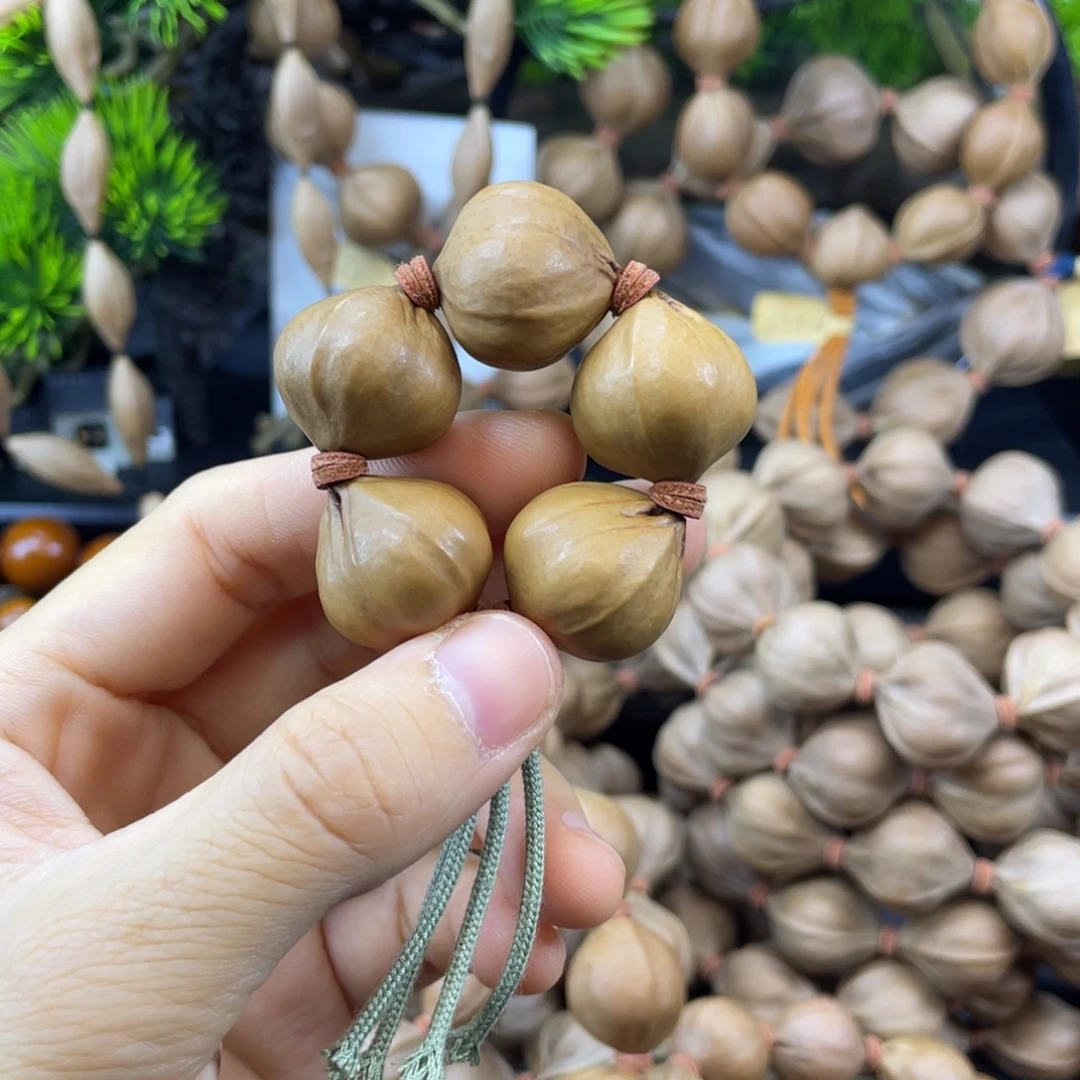 i***.橄榄核吊坠手捻老料