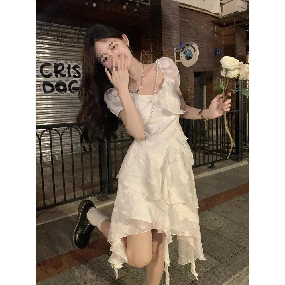 茶歇法式初恋白色不规则连衣裙女2025夏超仙海边度假公主裙小个子