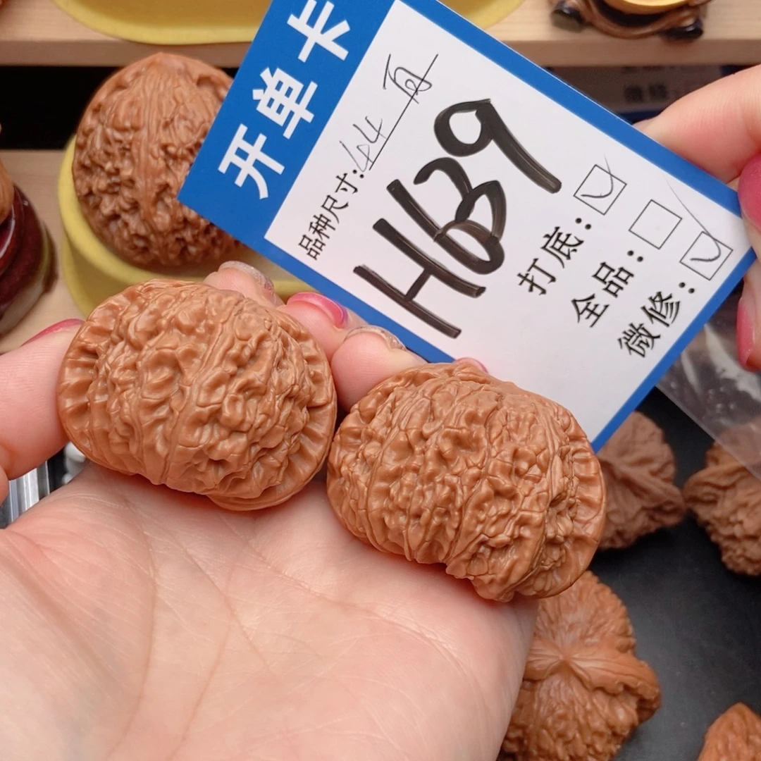 通***人桃核吊坠核桃白狮子