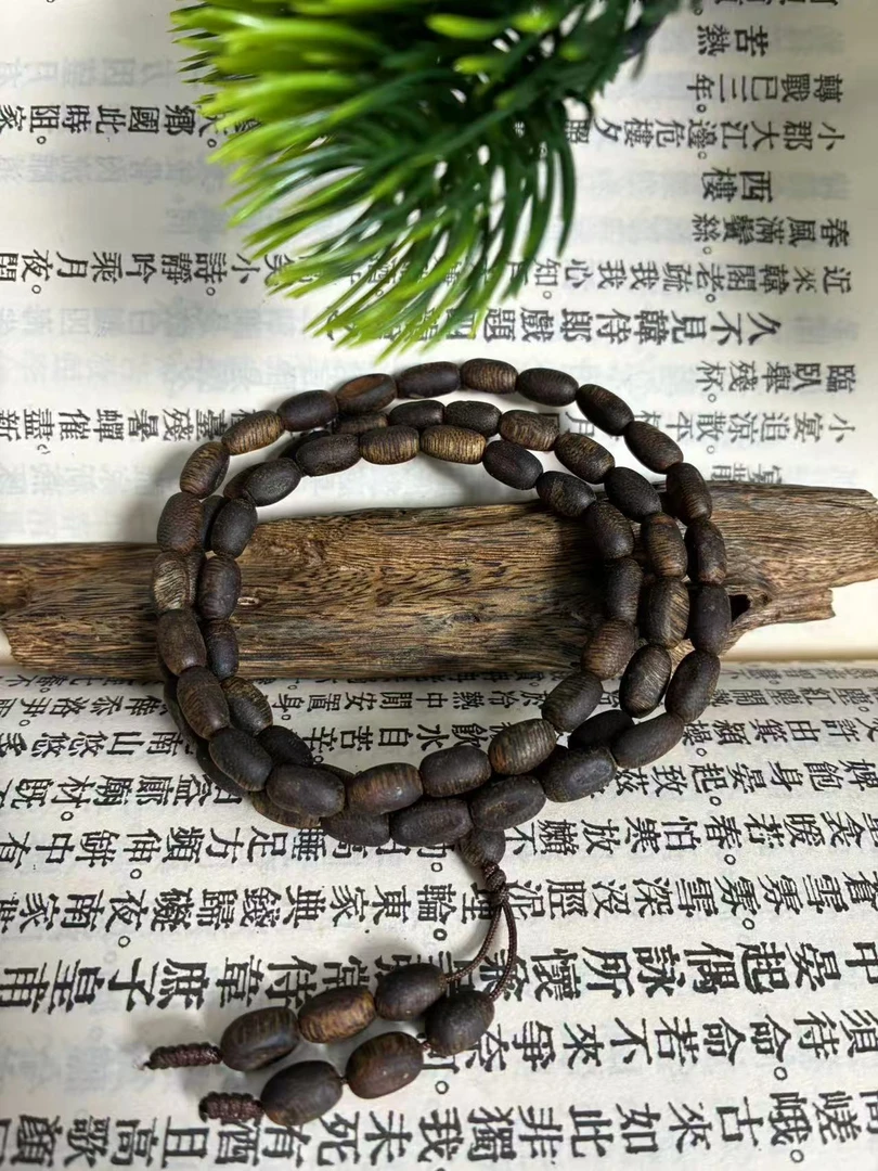 沉香海南【莺歌绿】沉香枣珠手串A04