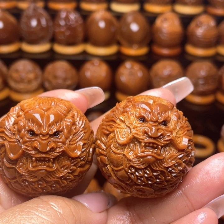 橄榄核把件金***娃橄榄雕刻