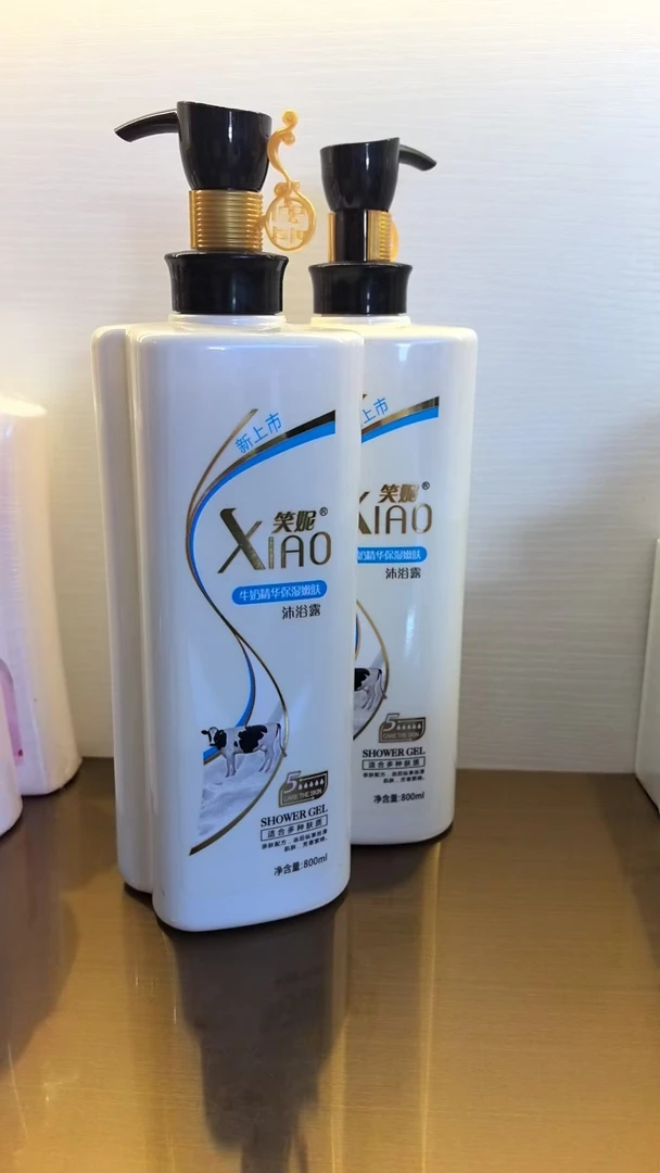 笑妮牛奶蚕丝沐浴露发2瓶