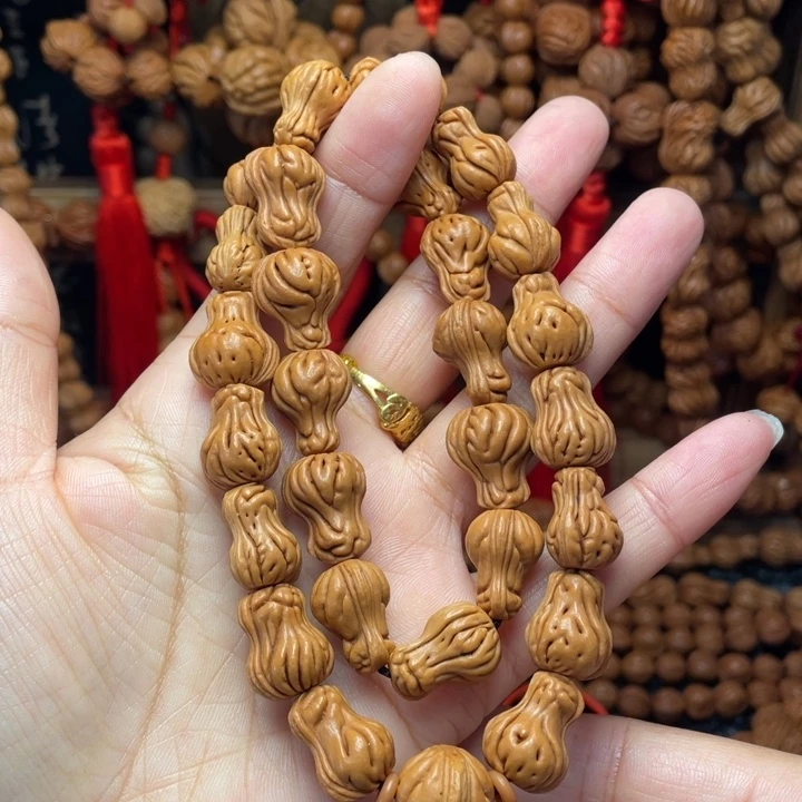 木质类龙纹桃枭挂件