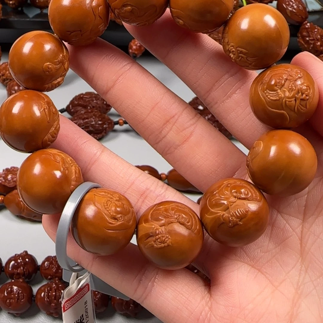 手串橄榄核南***℡油核观音手串