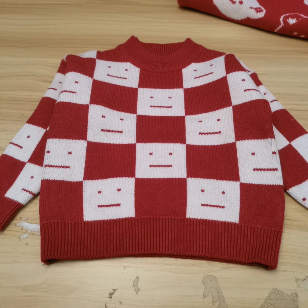 童装毛衣红色笑脸棋盘格