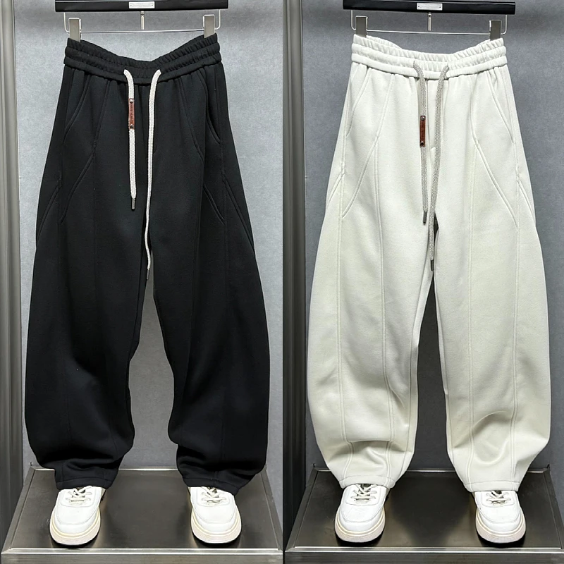 2025秋冬新款潮牌纯色休闲裤男士宽松潮流帅气抽绳百搭运动裤卫裤