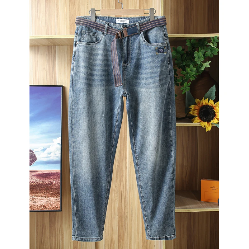 商场单帅气时尚牛仔裤男夏季薄款水洗蓝色弹力青年锥形版长裤子