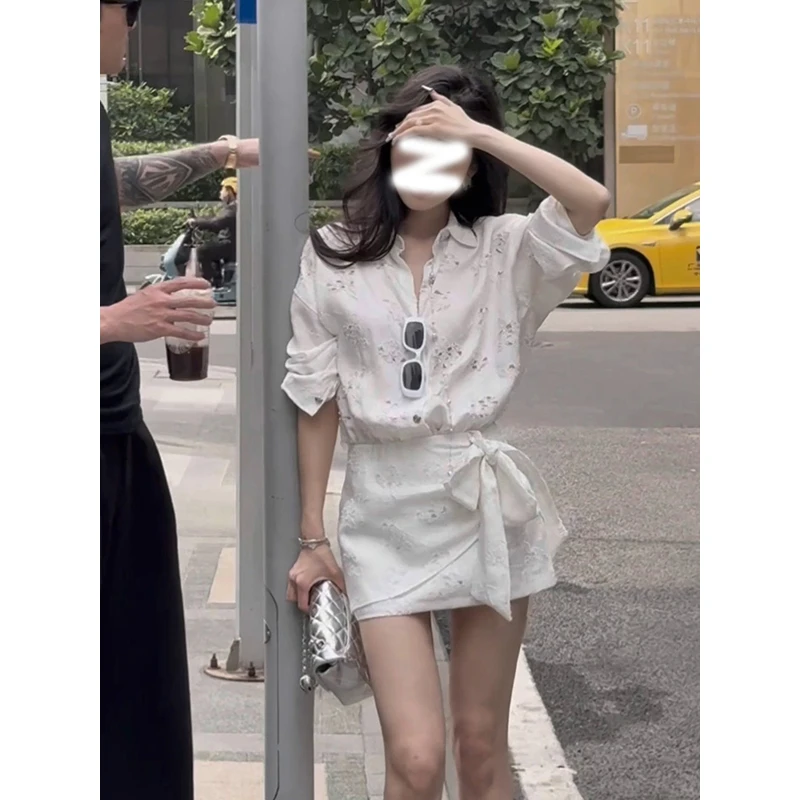 法式镂空钩花衬衫连衣裙女春季新款设计感收腰显瘦别致绝美短裙子