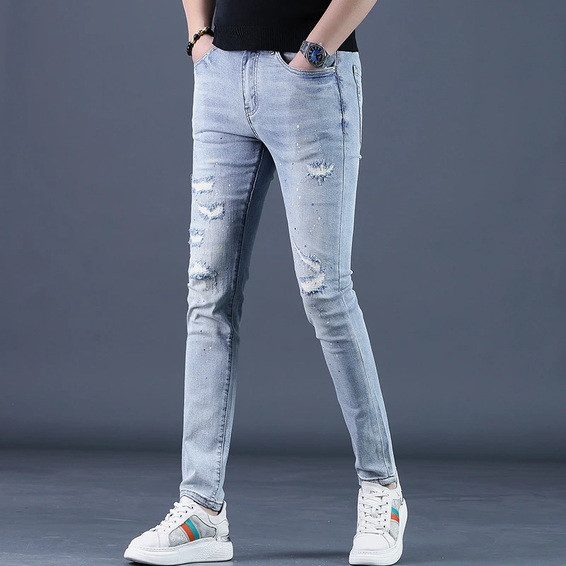 春季新款蓝色牛仔裤男破洞修身小脚潮流刮烂潮牌时尚百搭男士裤子