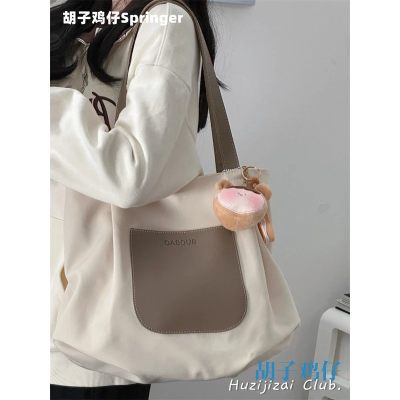 大容量包包女韩版少女简约休闲百搭通勤单肩包潮托特包轻便旅行包