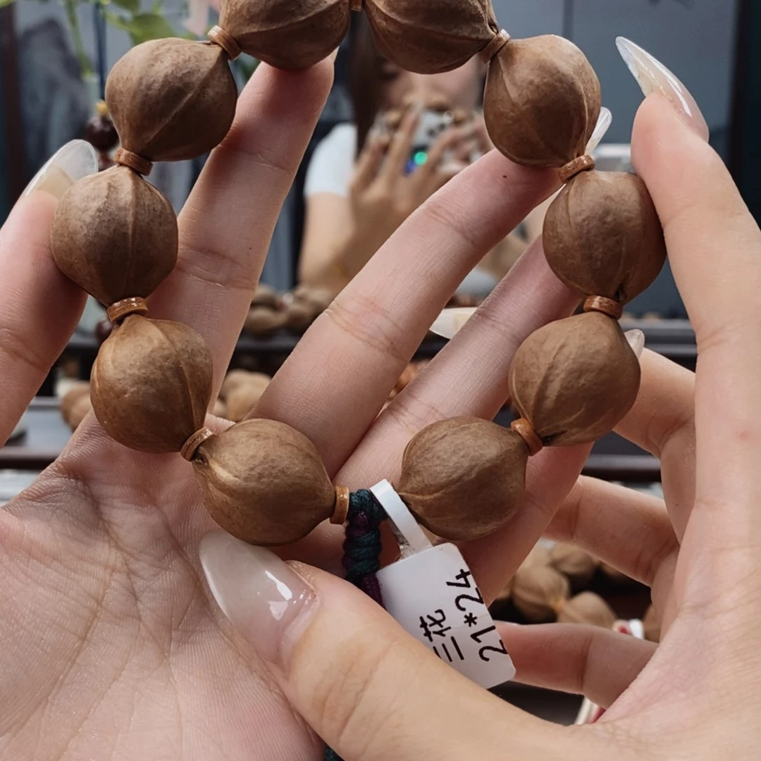 橄榄核吊坠a****8原生态正宗梅林铁核