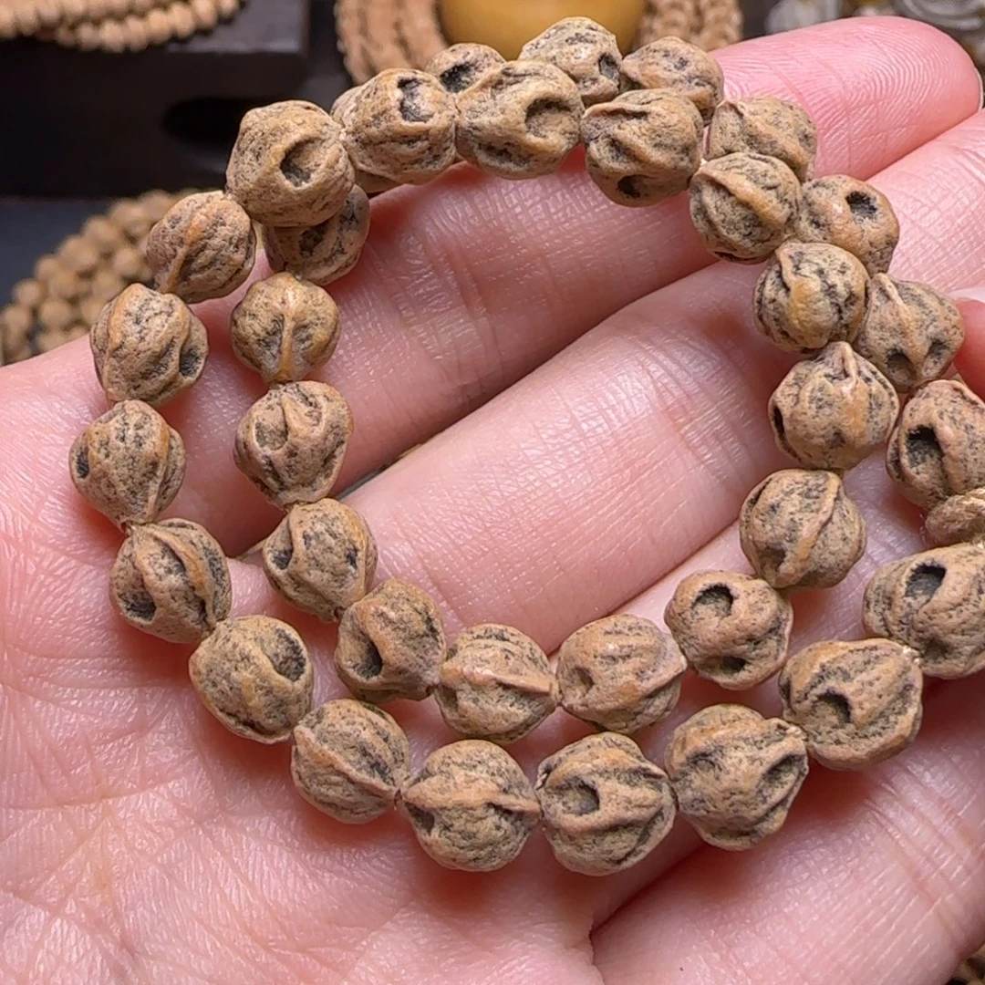 泉***哥柏香籽/百香籽吊坠