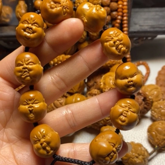 橄榄核吊坠人生百态