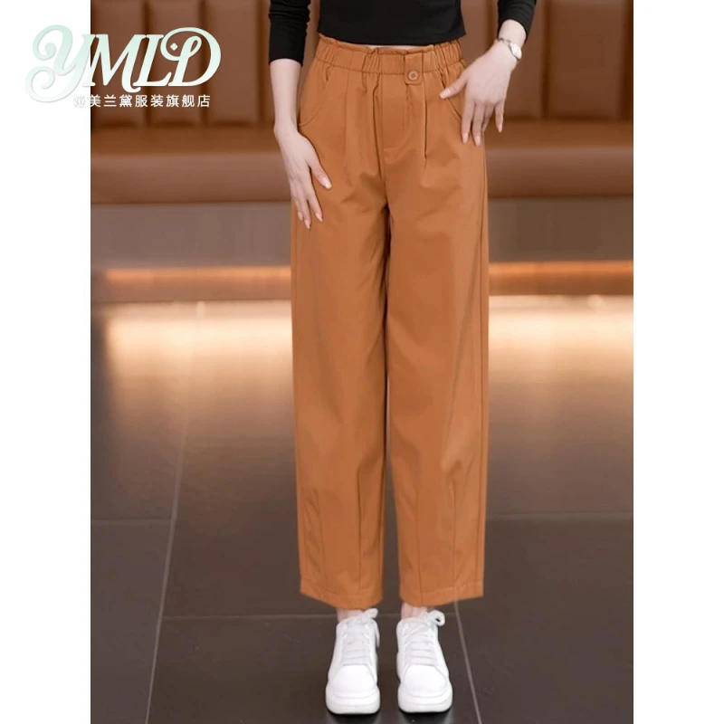 橙色哈伦裤子女2025年新款夏天流行的薄款宽松花苞裤九分直筒裤子