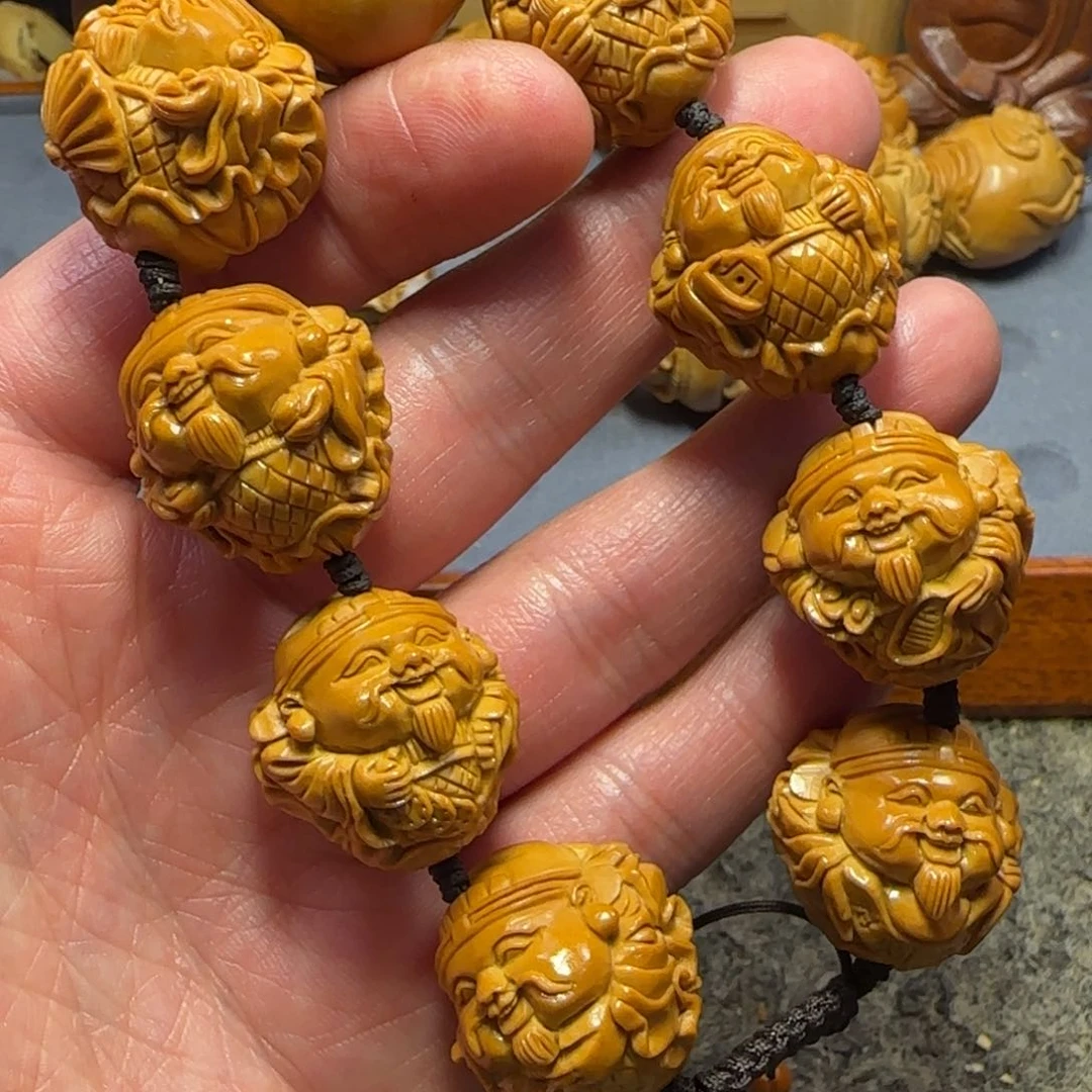 橄榄核吊坠荷叶财神