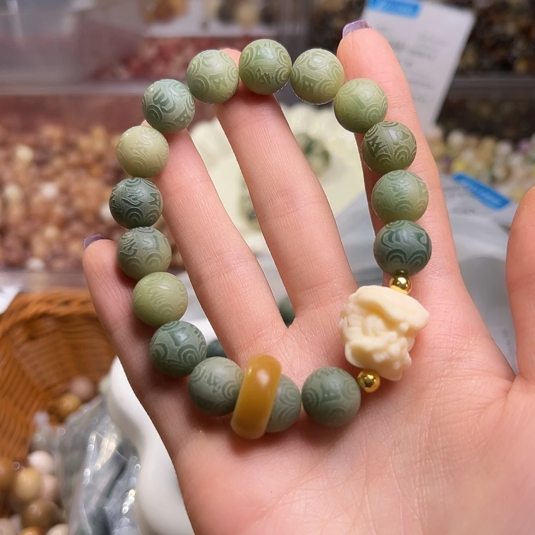 菩提根/象牙果吊坠六字手串一条