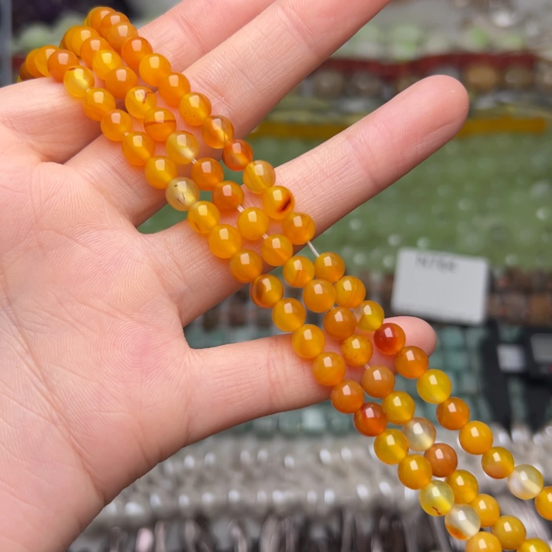 玛瑙/玉髓合金珠宝半成品N784。6.3mm天然红胶花黄玛瑙圆珠一条