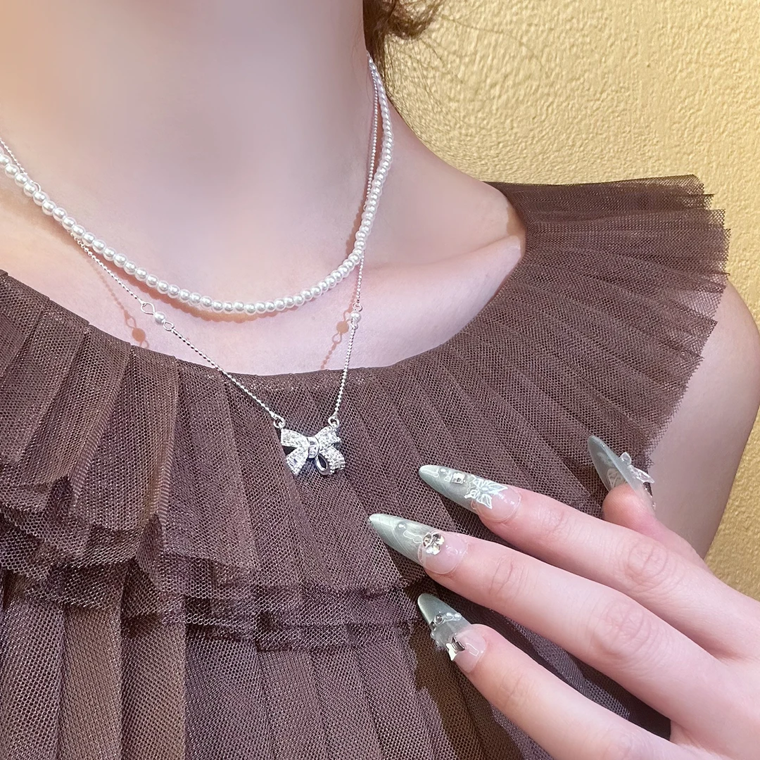 SHOWDIGU 铜合金仿珍珠项链 满钻蝴蝶结贝珠项链独特百搭锁骨链女