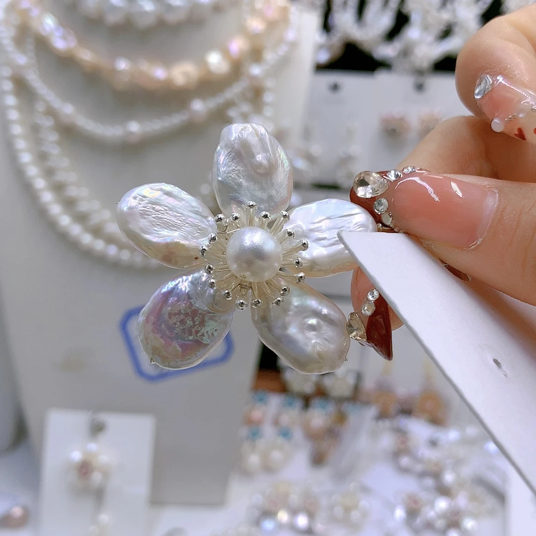 银S925镶嵌耳饰淡水珍珠烟****?